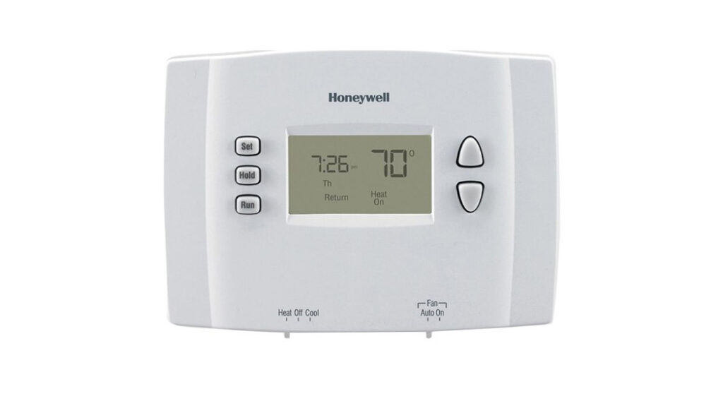 Honeywell Single-Stage RTH2410 Programmable Thermostat Owner’s Manual